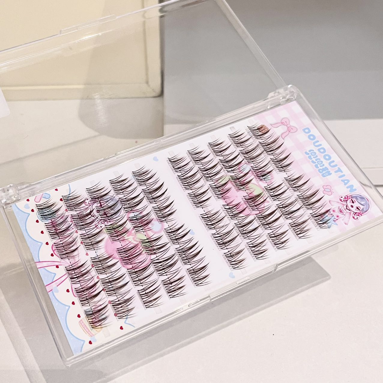 Doudoutian Brown Black Cluster - огляд і ціна Eyelash Extension Natural